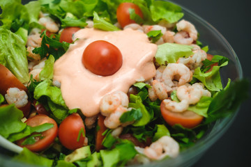 Shrimp and white bean salad. View from above, top studio shot