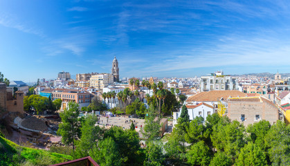 Fototapeta na wymiar Panoramic view of big city, the cathedral of Malaga, church of St. Augustine and roman theatre. Costa del Sol. Malaga. Andalusia. Spain.