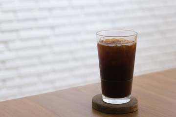 A glass of ice black coffee