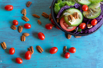 Green salad with sweet tomato, bright colors for fit people and who eat nutritious