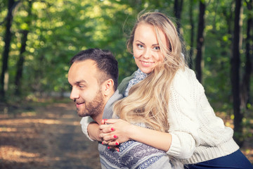 Portrait of young couple enjoying a day in the park together