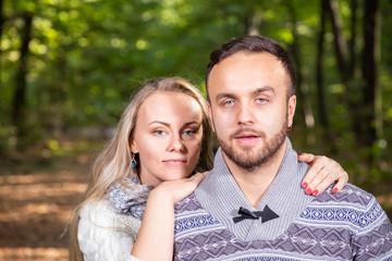 Portrait of young couple enjoying a day in the park together