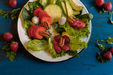 Green salad with sweet tomato, bright colors for fit people and who eat nutritious