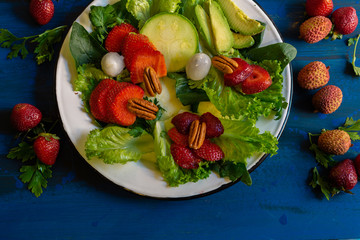 Green salad with sweet tomato, bright colors for fit people and who eat nutritious