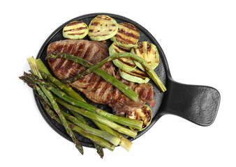 Tasty grilled meat with asparagus and zucchini isolated on white, top view