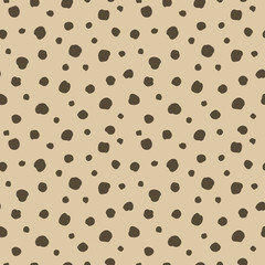 Vector seamless polka dots pattern in a chaotic manner. Hand drawn, doodle style. Design for fabric, wrapping, wallpaper, textile