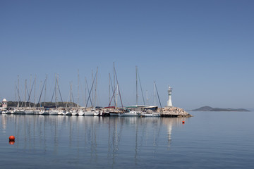 Fototapeta na wymiar Urla, Turkey - may 12, 2020 : Harbour view in Iskele, Urla. Urla is populer fishing old town in Izmir.