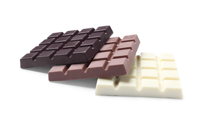 Different delicious chocolate bars isolated on white