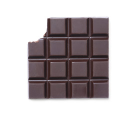 Delicious dark chocolate bar with bite mark isolated on white