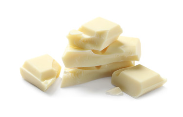 Pieces of delicious chocolate bar isolated on white