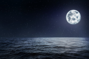 Fototapeta na wymiar Beautiful seascape with full moon in night sky