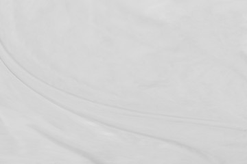 White cloth background abstract with soft waves.