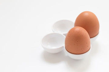 Organic eggs isolated on white background.