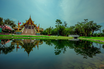 Fototapeta premium Background of Wat Pa Charoen Rat, Pathum Thani Province Dharma Practice Center 13, Buddhist people come to make merit, Khlong 11 (Sai Klang), Bueng Thonglang Subdistrict Lam Luk Ka District, Thailand
