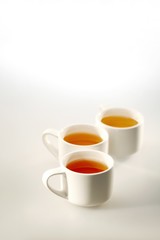 Close up of three cups of tea