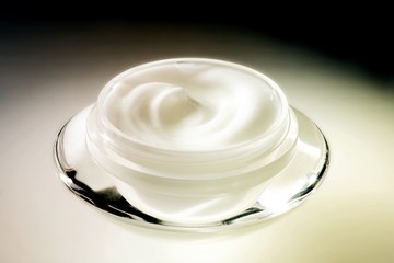 Obraz na płótnie Canvas Close up of a jar of cream