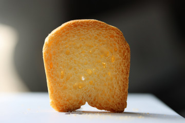 Miniature bread with a casting shadow