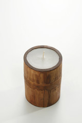 Candle in bamboo holder