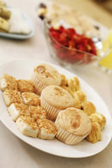Traditional cookies and cupcakes on a plate