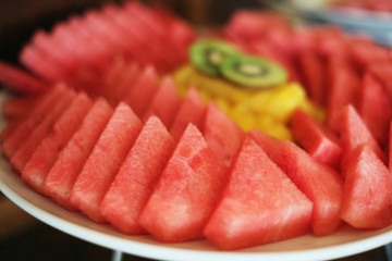 Watermelon and other fruits on a plate