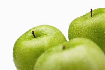 Green apples with water droplets