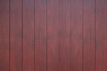 Red oak wood background texture. Plank made of oak for background. The wall wooden texture background. Vertical of the red wood texture.