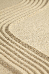 Fototapeta na wymiar Smooth and rippled sand surface