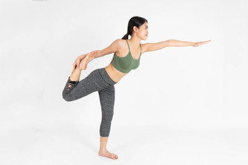 Young woman exercise yoga on white background