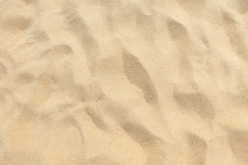 Fototapeta na wymiar Beautiful beach sand texture in summer time