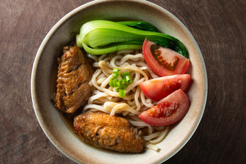
Delicious Chinese noodles with chicken wings 