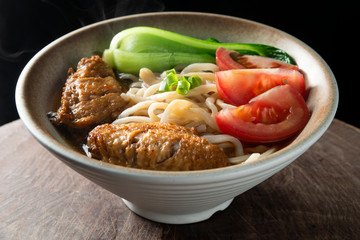 
Delicious Chinese noodles with chicken wings 