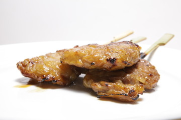 Grilled pork on a white background