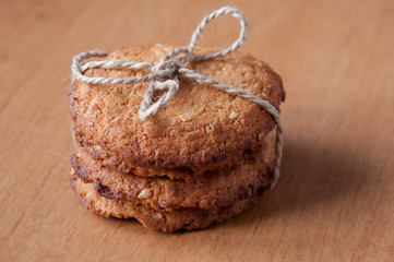 Oatmeal cookies tied with string on the table