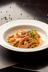 pasta fetuccini with shrimp and spices sauce