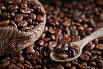 coffee beans in bag with dark light background