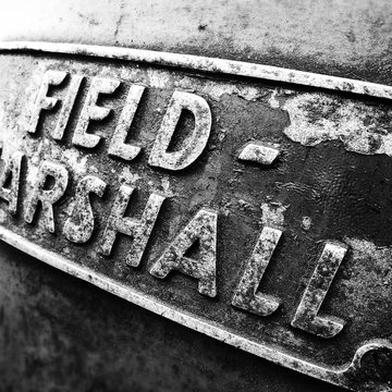 Close-up Of Field Marshal Text On Metal