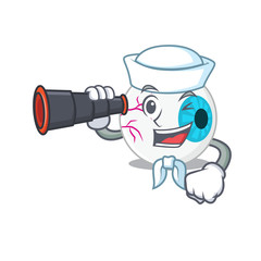 A cartoon picture of eyeball Sailor using binocular