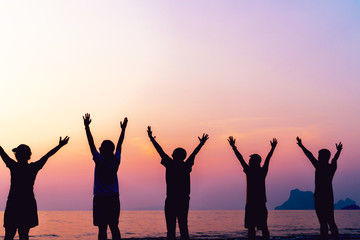 Fototapeta premium Woman rise hands up to sky freedom concept with blue sky.