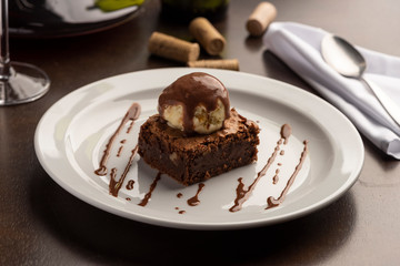 Chocolate Brownie with ice cream and topping