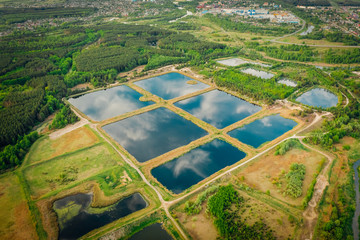 Artificial pond, for maintenance and purification of water from sewage. Water storage for...
