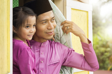 Malay man and his daughter