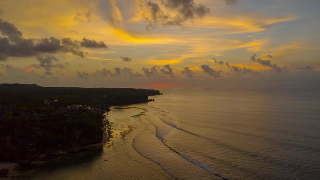 sunset sky bali island famous coastline beach bay aerial timelapse panorama 4k indonesia