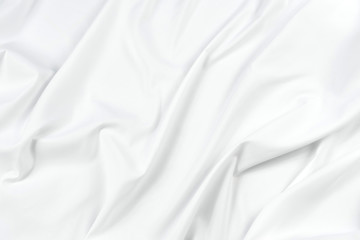 Obraz premium Abstract white fabric texture background. Cloth soft wave. Creases of satin, silk, and cotton. 