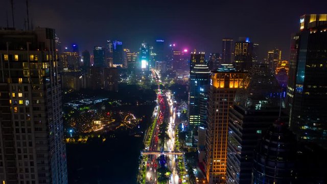 night illumination jakarta city traffic street downtown aerial timelapse panorama 4k indonesia