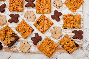 Homemade shortbread cookies lying on a white painted wooden surface. Baking and cooking.