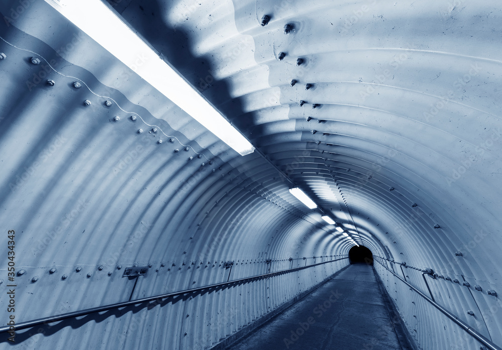 Poster empty pedestrian tunnel at night. architecture abstract background