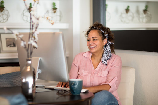 Mixed Race Woman Working From Her Home Office.