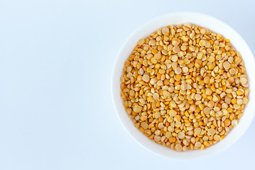 Yellow and green peas isolated on white background