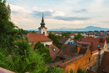 Obraz premium Traditional Steeple in Ljubljana at sunset