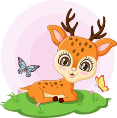 Cute little deer sitting in the grass